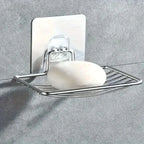 Stainless Steel Self Adhesive Wall Mount Soap Dish Holder with soap resting on it, showcasing sleek design and durability.
